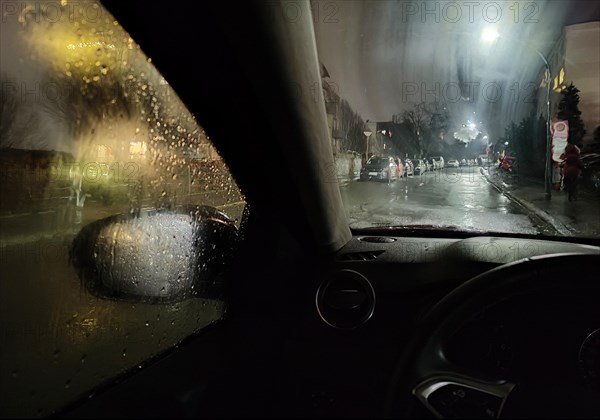 View from the car in dangerously poor visibility at night with rain and steamed-up windows, Dortmund, Ruhr area, Germany, Europe