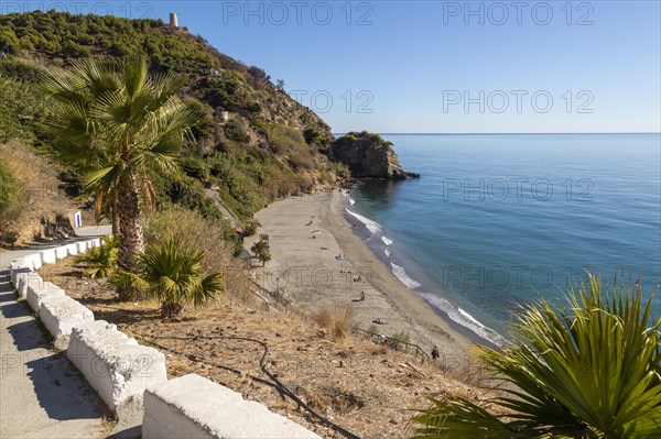 Sandy beach of Playa de Maro, near Nerja, Andalusia, Spain with calm Mediterranean Sea, out of season