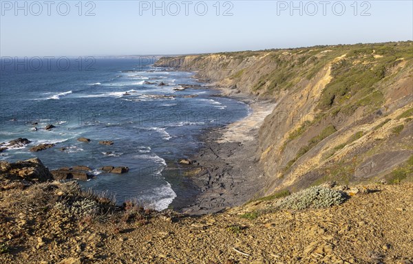 Rocky rugged coastal landscape on the Rota Vicentina Fisherman's Trail long distance footpath route, near Bunheira, Aljezur, Algarve, Portugal, Southern Europe, Europe