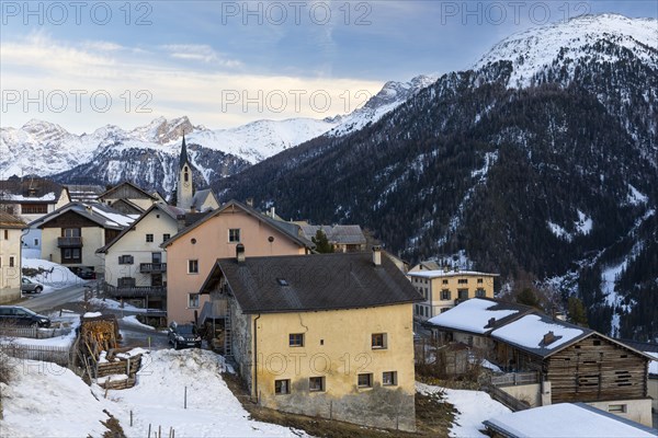 Historic village in front of a mountain peak, snow, winter, Guarda, Engadin, Grisons, Switzerland, Europe