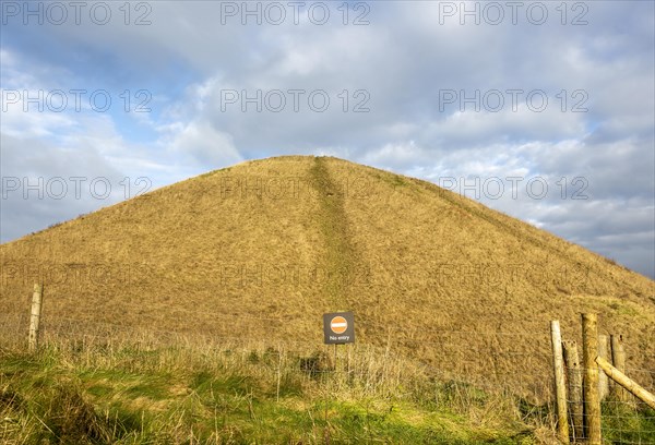 No Entry sign neolithic prehistoric mound of Silbury Hill, Wiltshire, England, UK to avoid human erosion of hill