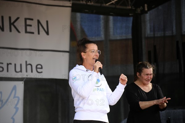 Karlsruhe: Tina Romdhani speaks about the situation of children, especially in schools, as part of the Corona protests against the measures taken by the federal government. The protests were organised by the Querdenken 721 Karlsruhe initiative