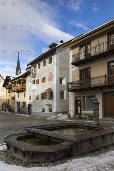 Wooden fountains, historic houses, sgraffito, facade decorations, Ardez, Engadin, Grisons, Switzerland, Europe