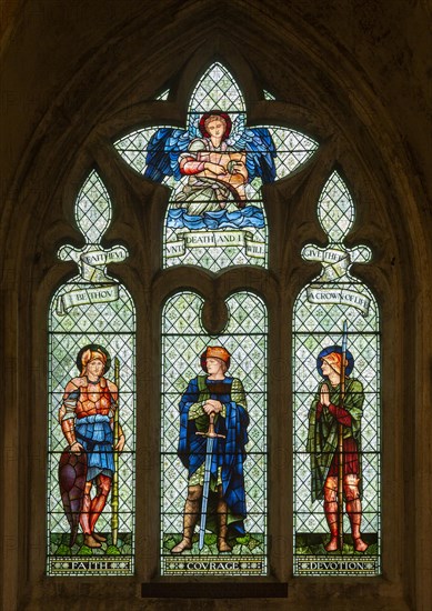 Stained glass window in Malmesbury abbey, Wiltshire, England, UK, Faith, Courage, Devotion by William Morris company c 1900