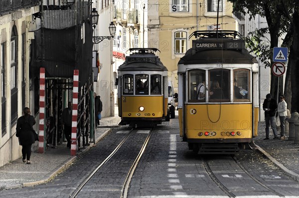 Trams on line 28, Alfama neighbourhood, Lisbon, Lisboa, Portugal, Europe