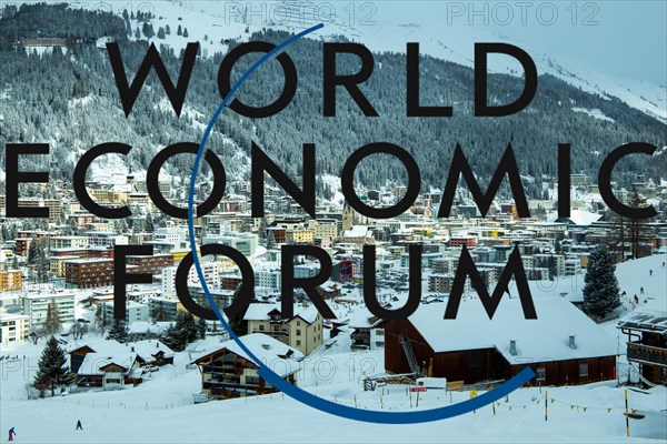 Logo of the WEF (World Economic Forum), in the background Davos from above