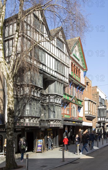 Historic Tudor buildings in High Street, Exeter city centre, Devon, England, UK