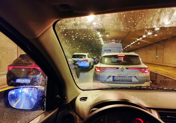 View from a car in a tunnel on the A 52 motorway with heavy traffic, Essen, Ruhr area, Germany, Europe