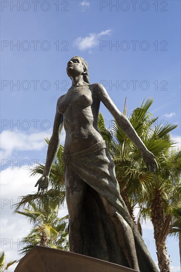 Sculpture of woman 'Mediterranea' by Luis Reyes, 2003, on seafront at Fuengirola, Costa del Sol, Andalusia, Spain, Europe