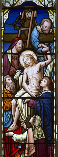 Stained glass window Deposition of Jesus Christ after his death by H. Hughes, 1871 Wilsford church, Wiltshire, England, UK
