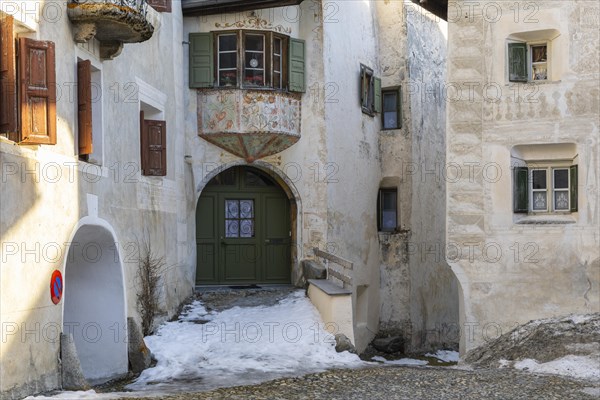 Bay window, entrance door, historic house, sgraffito, facade decorations, Guarda, Engadin, Grisons, Switzerland, Europe