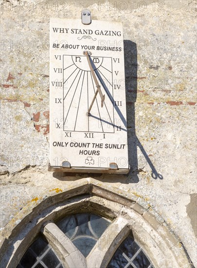 Sundial church of St Michael South Elmham, Suffolk, England, UK Why Stand gazing Be About Your Business