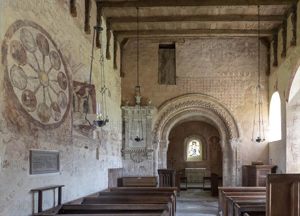 Medieval frescoes church of Saint Mary, Kempley, Gloucestershire, England, UK, Norman chancel arch