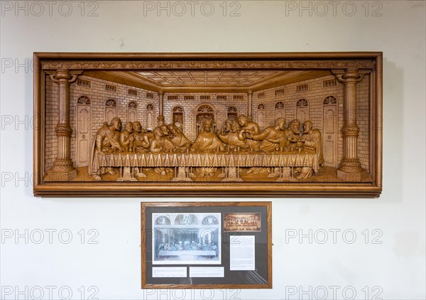 Village parish church of Saint Michael and All Angels, Hilperton, Wiltshire, England, UK teak wood carving of Last Supper