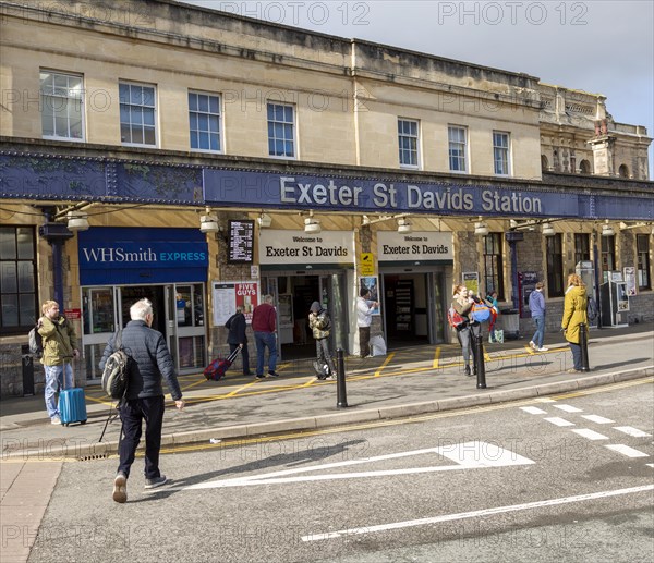 Passengers outside Exeter St David's railway station, Exeter, Devon, England, UK