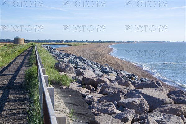 Shingle bay bar and lagoon landforms with rock armour coastal defences at Bawdsey, Suffolk, England, UK