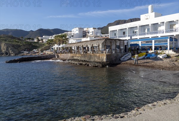 Seafront restaurant, hotel and housing at Isleta del Moro, Cabo de Gata natural park, Almeria, Spain, Europe