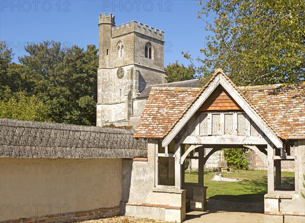 Lychgate entrance to Church of All Saints, Enford, Wiltshire, England, UK