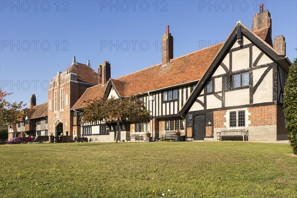 Historic almshouses building in Thorpeness, Suffolk, England, UK