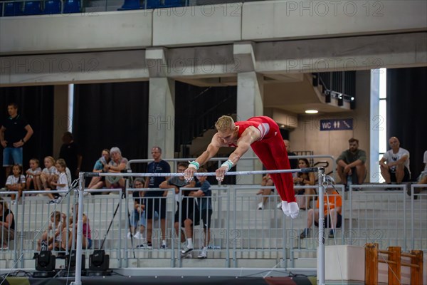 Heidelberg, 9 September 2023: Men's World Cup qualification in conjunction with a national competition against Israel. Lucas Kochan performing his routine on the high bar