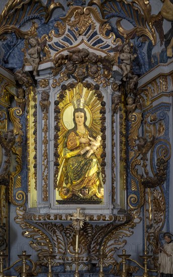 Ornately decorated statue of Blessed Virgin Mary 17th century church of Igreja de Santiago, Tavira, Algarve, Portugal, Southern Europe, Europe