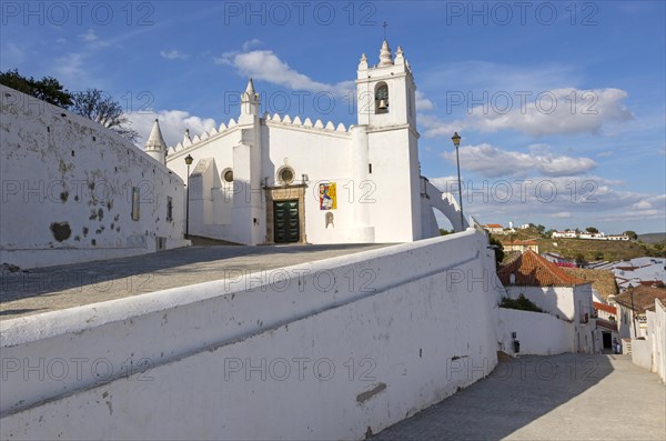 Historic whitewashed church Igreja Matrix in medieval village of Mertola, Baixo Alentejo, Portugal, Southern Europe, Europe