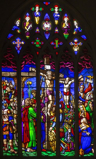 Stained glass window in church of Saint Margaret of Antioch, Leigh Delamere, Wiltshire, England, UK by Wilmshurst 1847 Crucifixion
