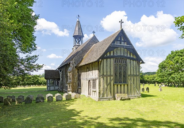 Village parish church of All Saints, Crowfield, Suffolk, England, UK with wooden timber framed chancel