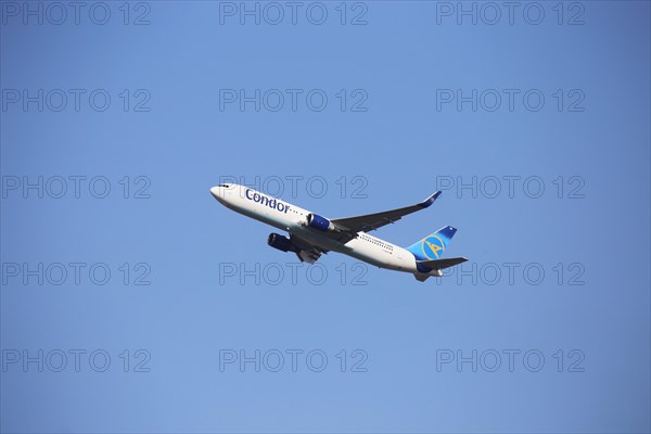 A Condor passenger aircraft takes off from Frankfurt Airport