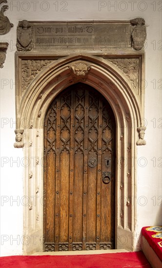 Interior of church of Saint Mary, Halesworth, Suffolk, England, UK, Vestry door dating from late 15th century