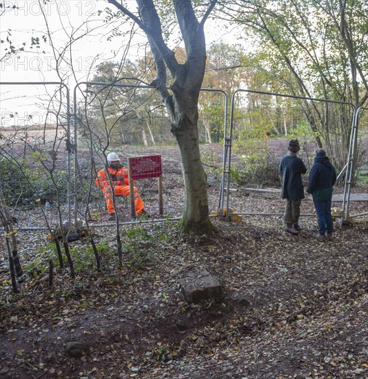 HS2 construction site Crackley Woods, Kenilworth, Warwickshire, England, UK, November 2020, security guard and fence