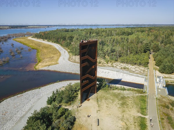 The 30 metre high landmark of the Lusatian Lakeland, the so-called Rusty Nail, was built at the mouth of Lake Sedlitz. It is a lookout tower made of 111 tonnes of Corten steel, with the base of a right-angled triangle with cathetus lengths of approximately twelve and eight metres. 162 steps lead to the viewing platform on the tower, Senftenberg, Brandenburg, Germany, Europe