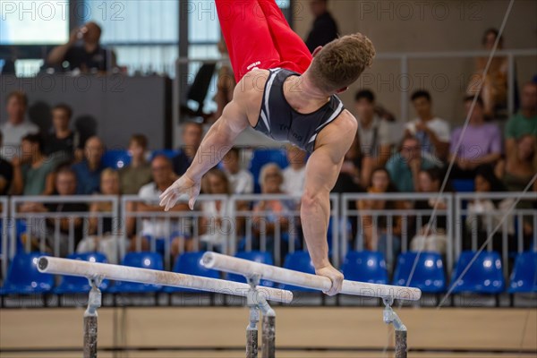 Heidelberg, 9 September 2023: Men's World Cup qualification in conjunction with a national competition against Israel. Glenn Trebing during his routine on parallel bars