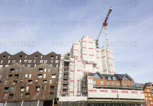 Work recommenced on the 'Wine Rack' building on the waterfront, Ipswich, Suffolk, England, UK, a property development stalled by the financial crash and again underway February 2019
