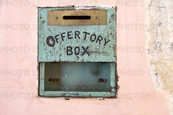 Village parish church Rendlesham, Suffolk, England, UK, offertory collection box