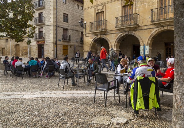 People sitting outside cafe Plaza Mayor, Briones, La Rioja Alta, Spain, Europe