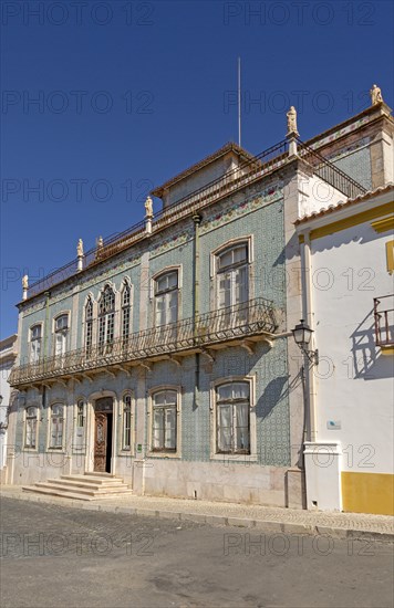Historic Portuguese building facade of ceramic tiles Azulejo pattern, Castro Verde, Baixo Alentejo, Portugal, southern Europe, Europe