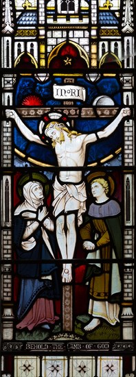 Victorian stained glass window, Tidworth south church, Wiltshire, England, UK by Clayton and Bell, Crucifixion