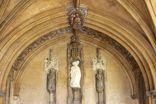 Statues cloisters stone recess, Norwich Cathedral, Norfolk, England, UK, King and Queen