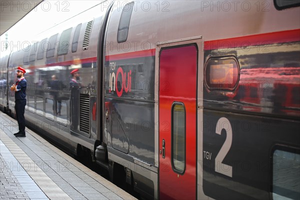 Stopping TGV at Mannheim main station with passengers boarding and alighting