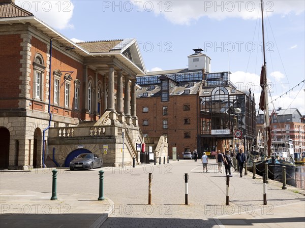 Historic and modern buildings waterfront at the Wet Dock, Ipswich, Suffolk, England, UK, left is the Old Custom House of Ipswich Port Authority c 1845