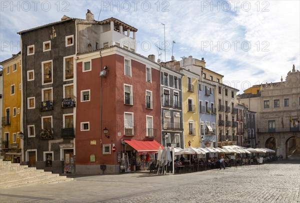 Colourful buildings cafes and shops, Plaza Mayor square, Cuenca, Castille La Mancha, Spain, Europe