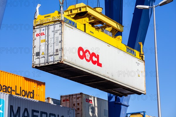 An OOCL Orient Overseas Container Line container is loaded in the port of Mannheim, Germany. Supply bottlenecks and a sharp rise in container prices are currently affecting global trade