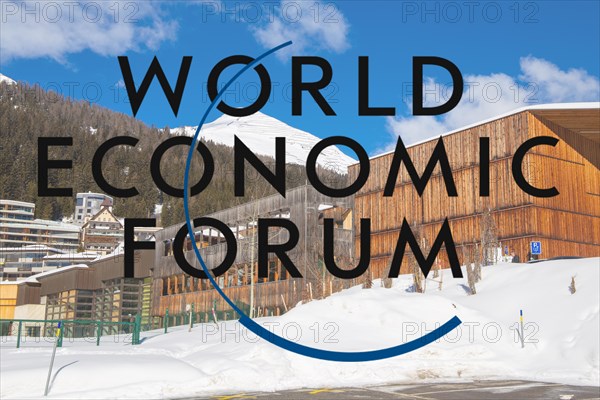 Logo of the WEF (World Economic Forum), in the background the Davos Congress Centre