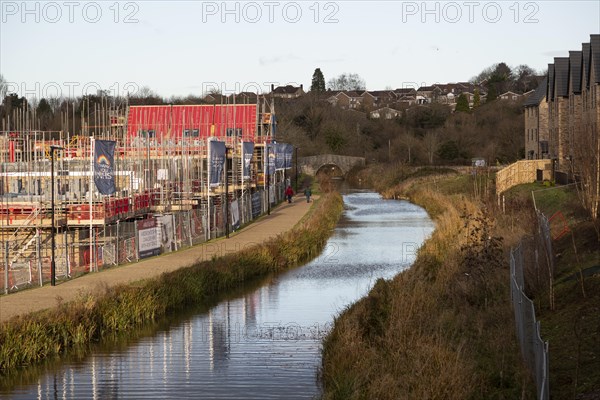 Construction work housing development along Wilts and Berks canal, Wichelstowe, Swindon, England, UK