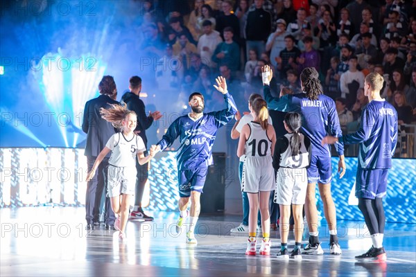 09/02/2024, easy Credit BBL, German Basketball League, Matchday 20) : Run-in of the players of MLP Academics Heidelberg in the game against Basketball Loewen Braunschweig (final score 76:94)