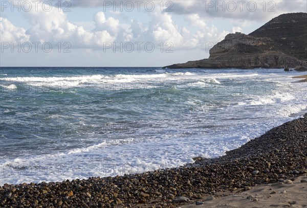 Waves breaking on beach at Las Negras, Cabo de Gata Natural Park, Nijar, Almeria, Spain, Europe