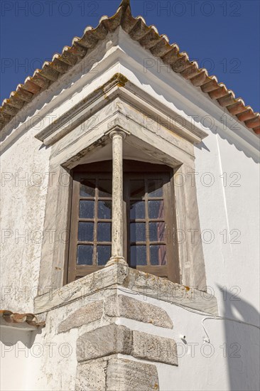 Window balcony and architectural detail of building inside historic walled hilltop village of Monsaraz, Alto Alentejo, Portugal, southern Europe, Europe