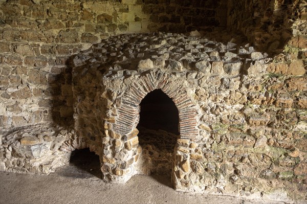 Bread oven bakery inside the 12th century Orford castle, Suffolk, England, UK