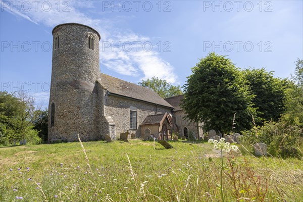 Church of Saint Peter, Bruisyard, Suffolk, England, UK round tower and churchyard